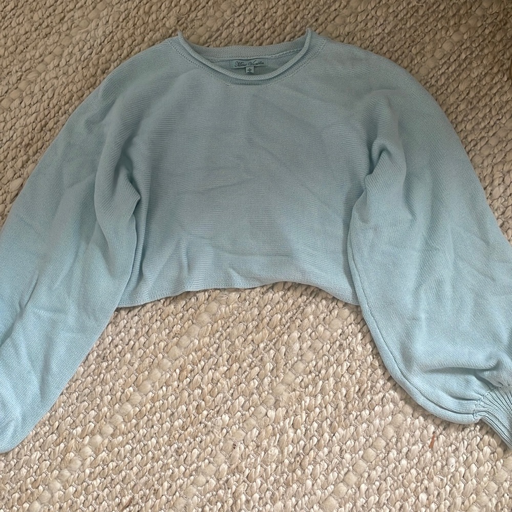 Sky blue cropped sweater. XS. Unsure of brand, came from an online boutique.